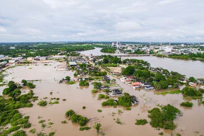 Cheia do rio Machado desabrigar famílias após muita chuva neste fim de semana